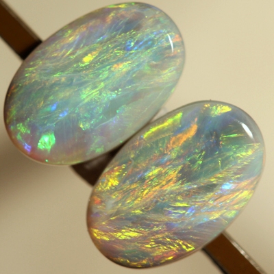 SOLID SEMI BLACK OPALS Matching pair. Bright, strong fire. SEE VIDEO